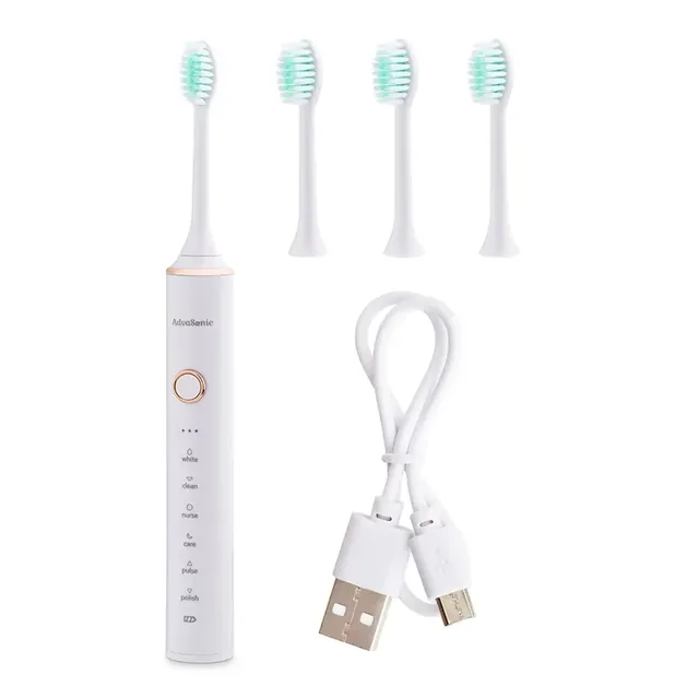 The white AdvaSonic toothbrush with a head fitted, three spare heads in a row and a coiled white USB cable, on white