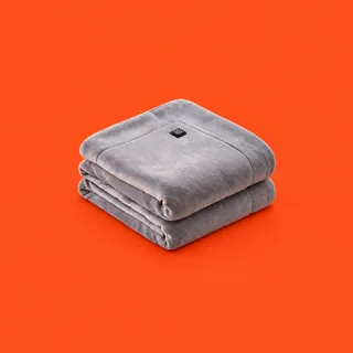 EmberHug, the fleece blanket folded, on a vermilion background