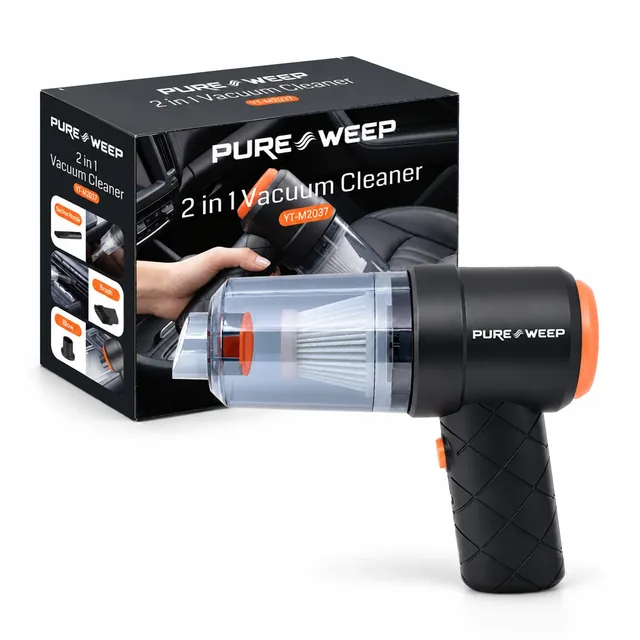 The black PureSweep mini vacuum with its clear dust cup and orange rear cap standing in front of its black box on white, the box printed with the PureSweep wordmark and 2 in 1 Vacuum Cleaner