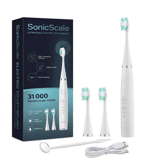Le kit SonicScale sur fond blanc : sa boîte bleu marine foncé, la brosse blanche debout, une tête en place, deux têtes de rechange, un miroir dentaire et un câble USB blanc