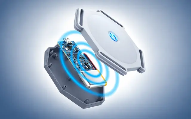 An exploded view of the SpineBuzz module: the white top shell with its lit blue power symbol lifted off the gray base, a blue circuit board and a silver battery between them