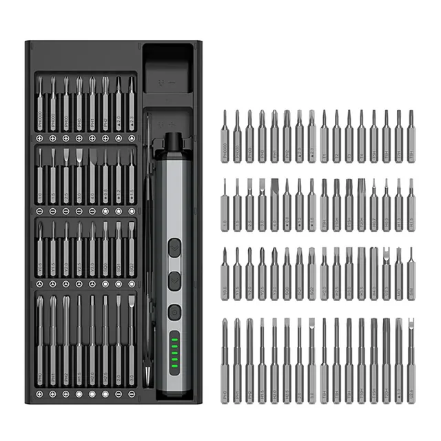 The Vorxis lying in its slot in the open black case beside a tray of labeled bits, and the 64 bits laid out in rows on white
